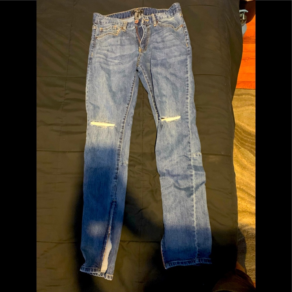 Men jeans with knee wholes